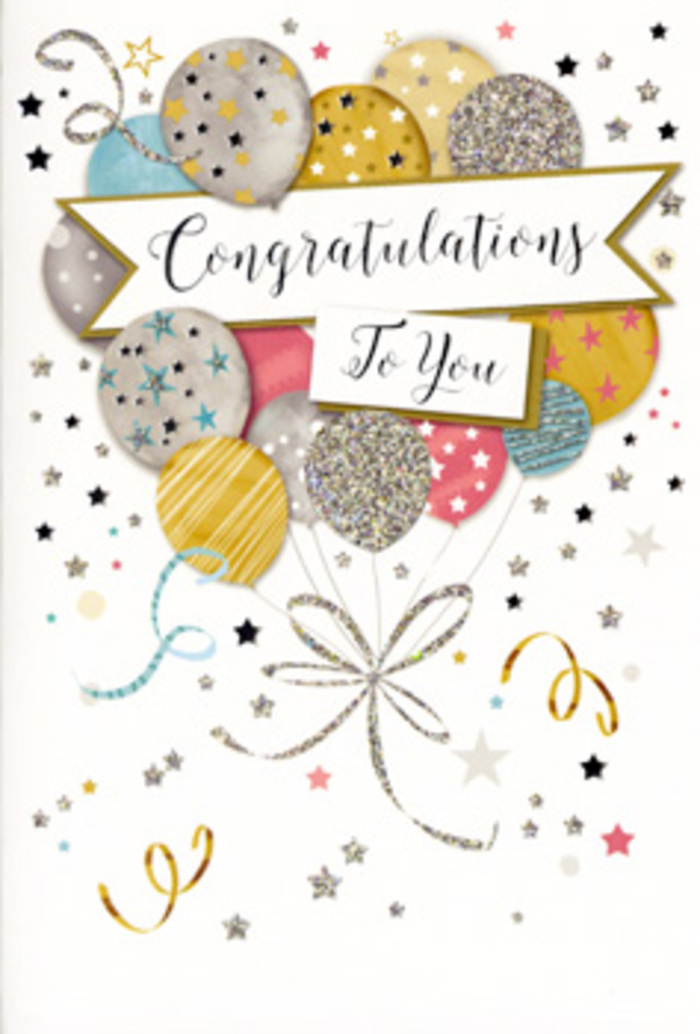 The photograph shows a sophisticated congratulations card designed around a lush bouquet of illustrated balloons, evoking the same sense of joyful lift you might feel wandering up the hill toward Crystal Palace Park with good news to share. At the heart of the composition, layered balloons in tones of warm gold, cool silver, champagne, sky blue, blush pink, and soft grey overlap in a gentle cluster, creating depth like a well-balanced floral arrangement. Each balloon is embellished with fine details-twinkling stars, delicate stripes, and sparkling glitter accents-suggesting a soft metallic sheen that glows against the understated, pale backdrop. From their bases, thin ribbons in gold and silver cascade downward in loose curls, visually tying the scene together as though they are being held just out of frame. Surrounding the central motif, scattered stars, tiny dots of confetti, and swirling ribbons drift across the card, giving the impression of motion and excitement, like confetti caught in a breeze outside a celebration on Gipsy Hill. A gently curved banner stretches through the centre, carrying the words 'Congratulations To You' in an elegant, flowing script that feels timeless and heartfelt. The style is refined yet warm, perfect for slipping alongside fresh, fragrant flowers when congratulating someone on exam success, a new job in London, or a special achievement celebrated at home near West Norwood or Dulwich. You can almost sense the slight texture of the glittery highlights and the smoothness of the card stock beneath your fingers, reflecting quality and care. The overall atmosphere is one of polished joy and quiet pride, a visual expression of genuine admiration crafted for significant milestones.